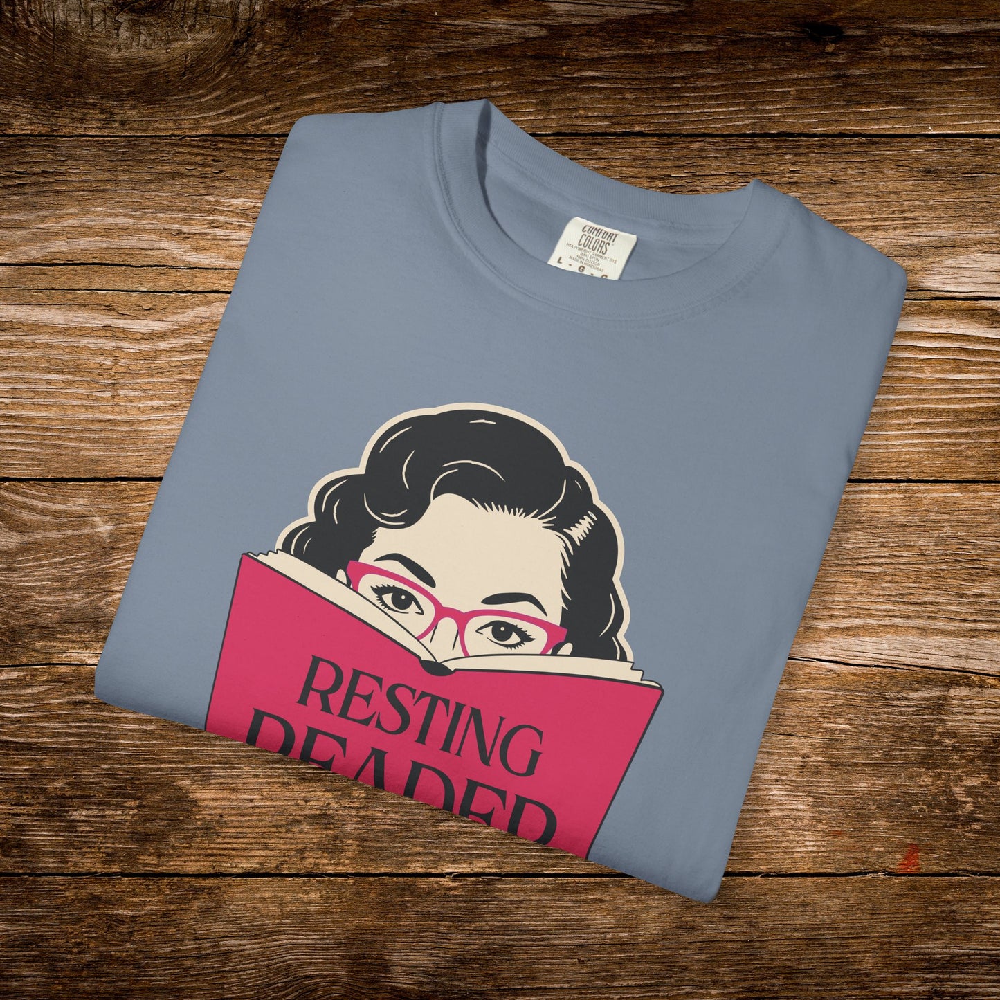 Folded blue spruce Resting Reader Face graphic t-shirt.