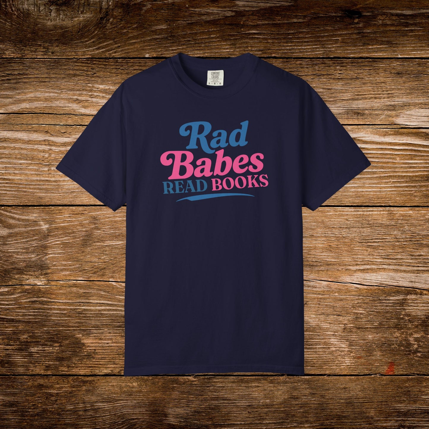 8. Navy Shirt
    Rad Babes Read Books graphic t-shirt shown on a navy Comfort Colors tee.