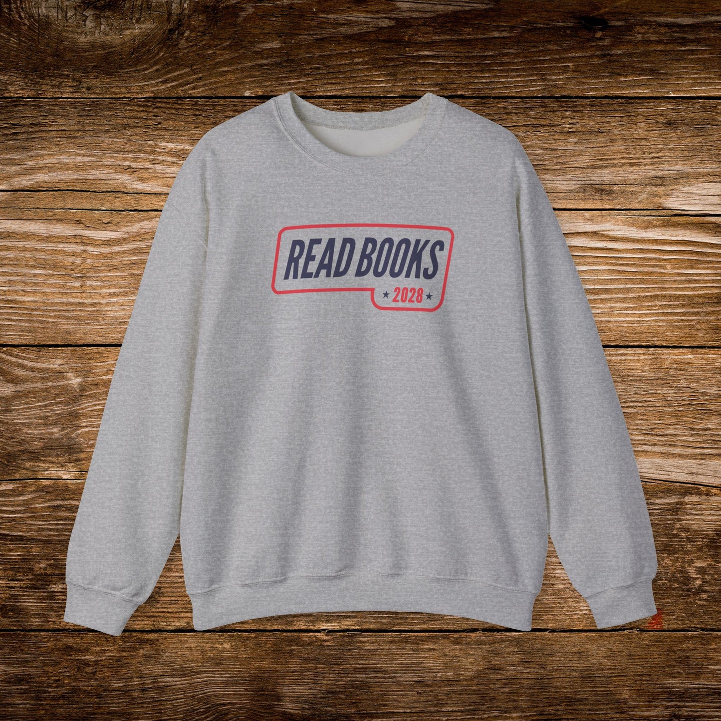 8. Sport Grey Sweatshirt
    Read Books 2028 graphic sweatshirt shown on a sport grey crewneck.