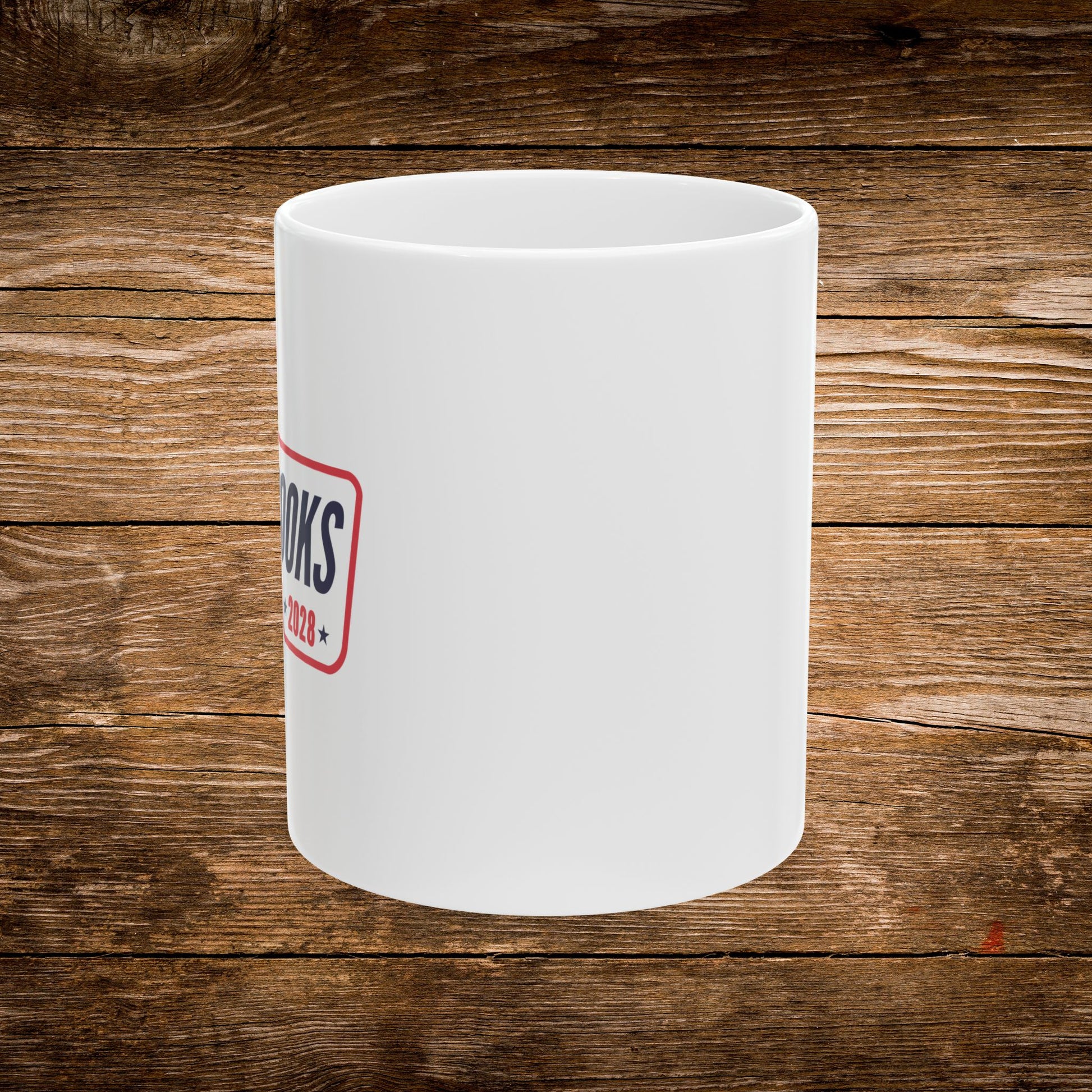 3. Left Side View
    White ceramic Read Books 2028 mug showing the left side of the wrap-around design.