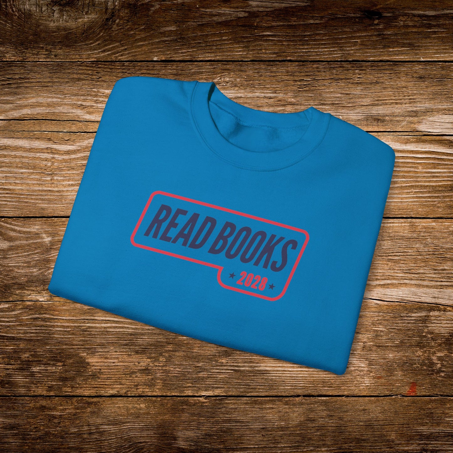 11. Sapphire Folded
    Folded sapphire Read Books 2028 graphic sweatshirt.