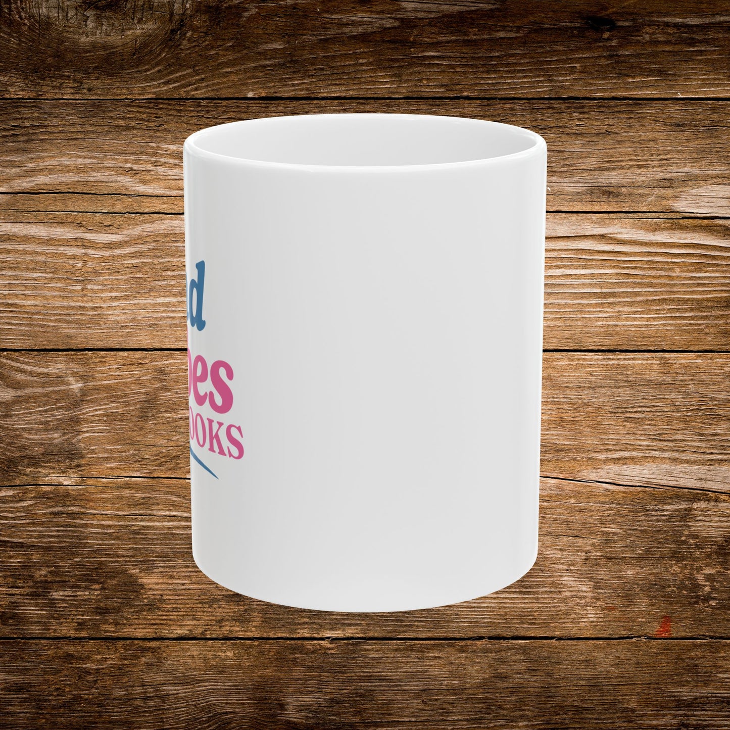 3. Left Side View
    White ceramic Rad Babes Read Books mug showing the left side of the wrap-around design.