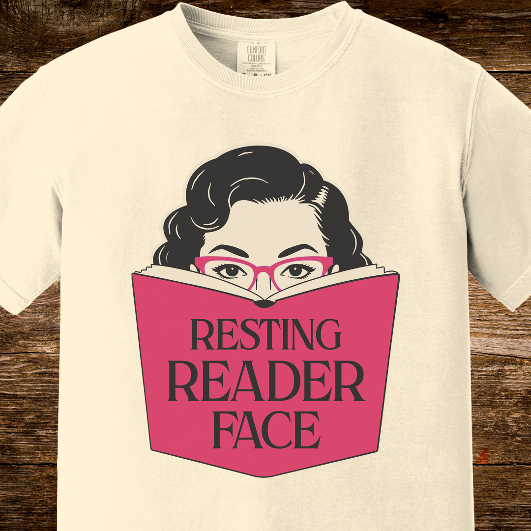 Resting Reader Face graphic t-shirt on an ivory Comfort Colors tee.