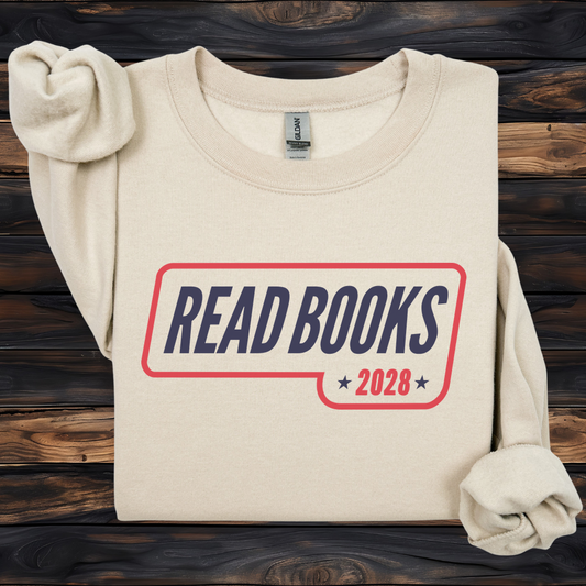 1. Main Image
    Read Books 2028 graphic sweatshirt on a sand Gildan crewneck.