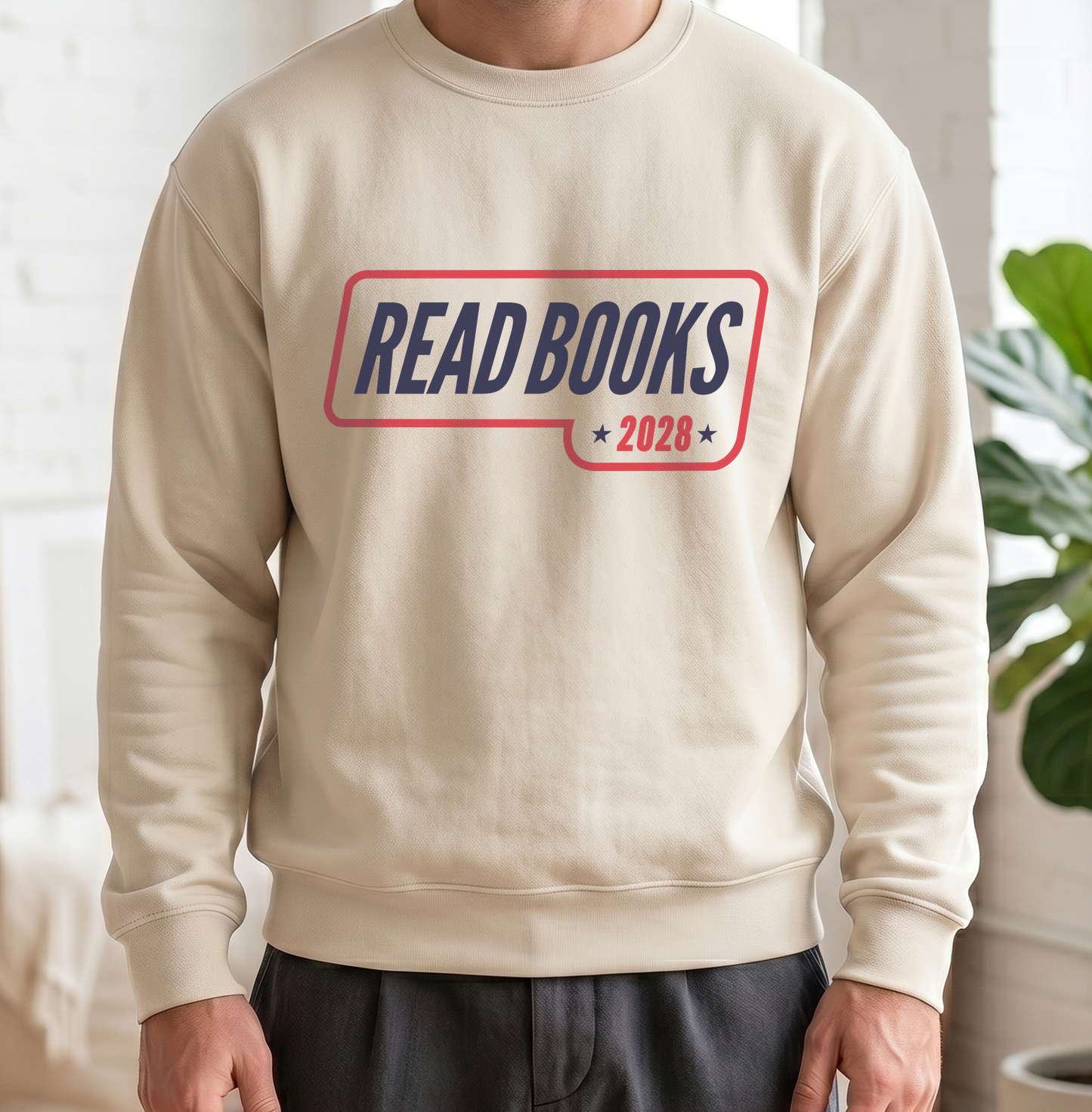 3. Lifestyle Mockup
    Man wearing the Read Books 2028 graphic sweatshirt.