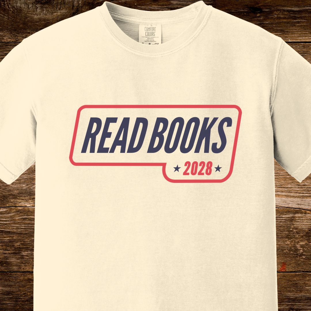 1. Main Image
    Read Books 2028 graphic t-shirt on an ivory Comfort Colors tee.