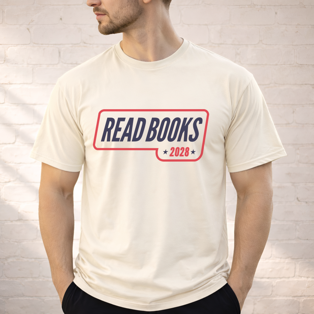 3. Lifestyle Mockup
    Man wearing the Read Books 2028 vintage campaign graphic t-shirt.