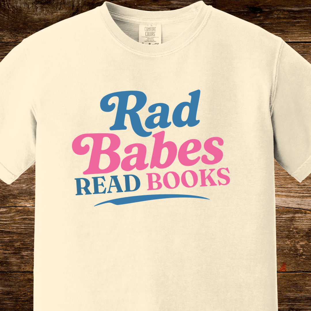 1. Main Image
    Rad Babes Read Books graphic t-shirt on an ivory Comfort Colors tee.