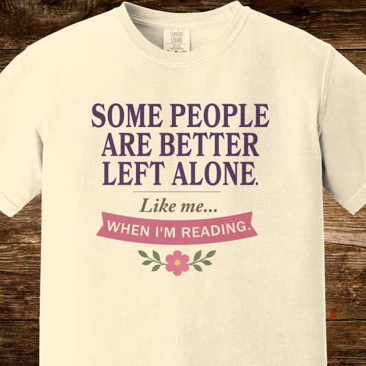 An off-white crewneck t-shirt with a graphic print that reads 'SOME PEOPLE ARE BETTER LEFT ALONE. Like me.
