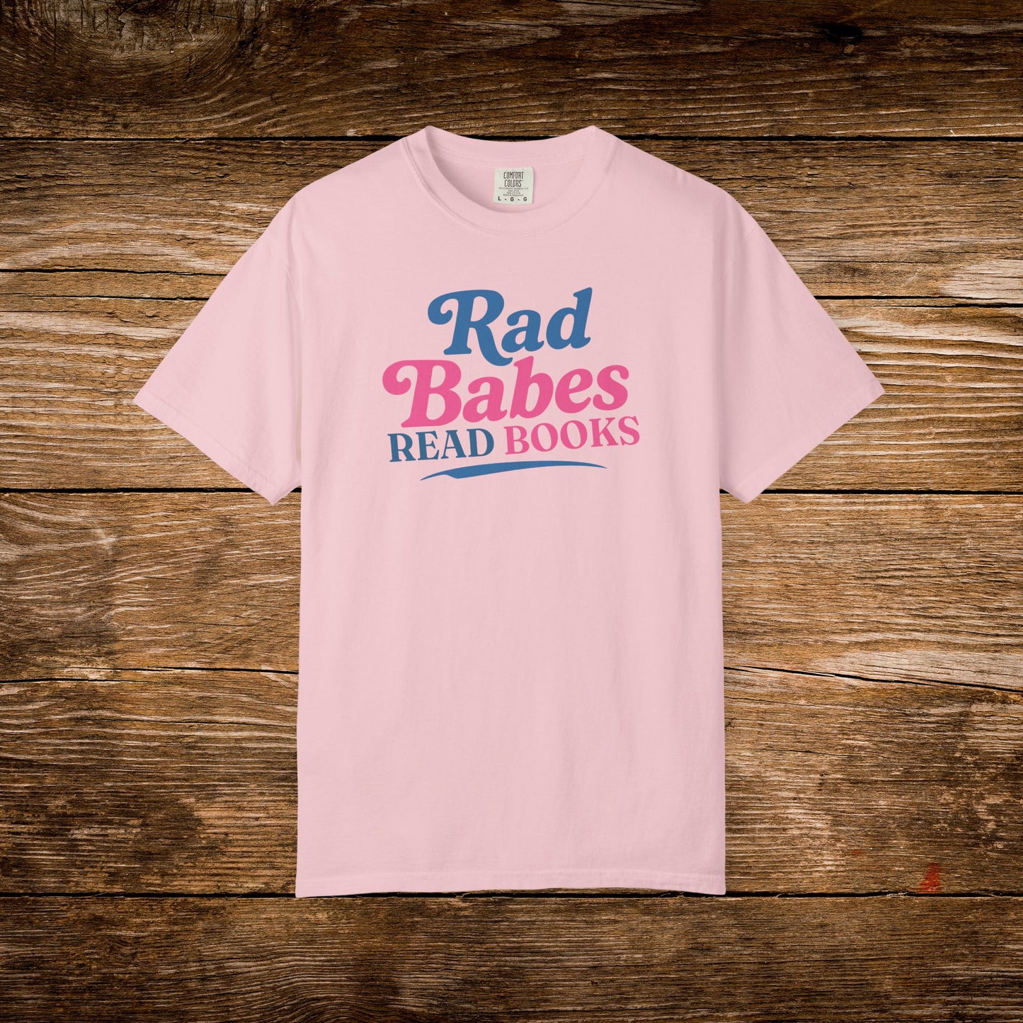 12. Light Pink Shirt
    Rad Babes Read Books graphic t-shirt shown on a light pink Comfort Colors tee.