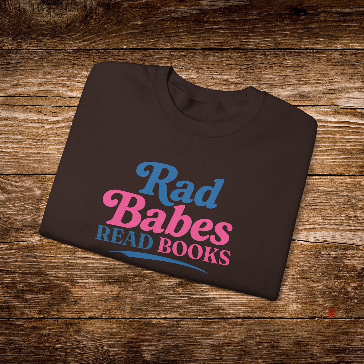 6. Dark Chocolate Folded
    Folded dark chocolate Rad Babes Read Books graphic sweatshirt.